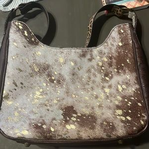 Nacona spotted calf shoulder bag. Medium sized new  never used. Real fur.